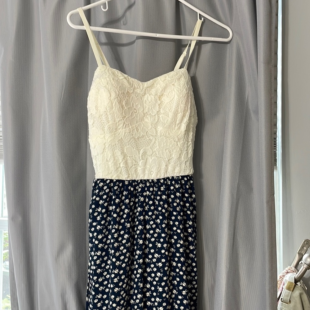 White and floral jumpsuit. Size medium. Francesca’s